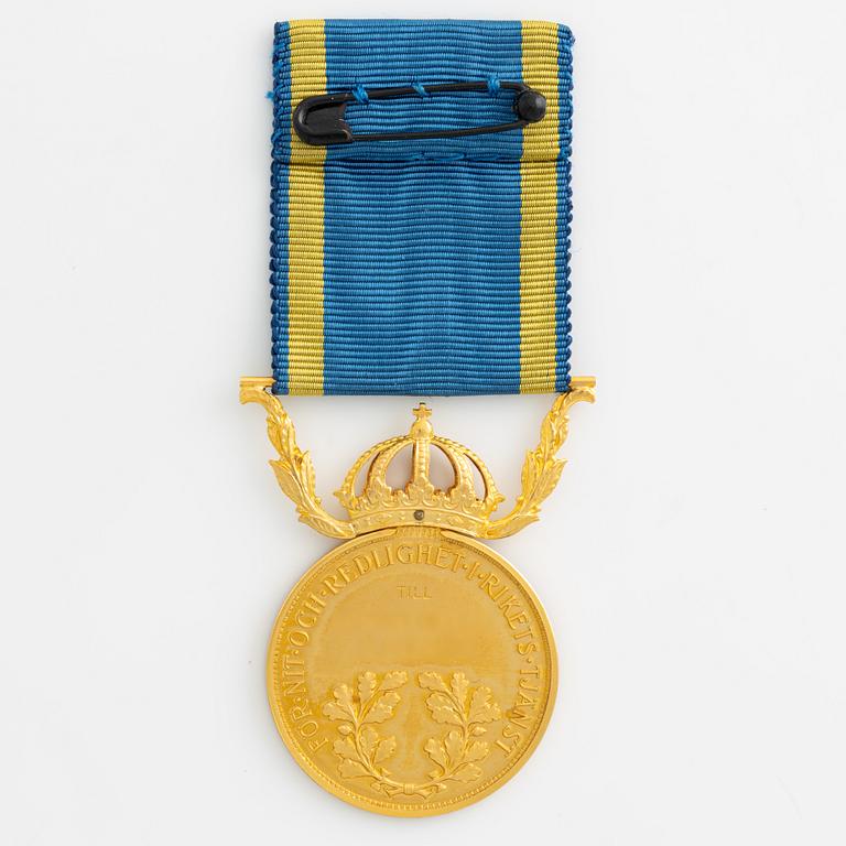 Medalj, 18K guld.