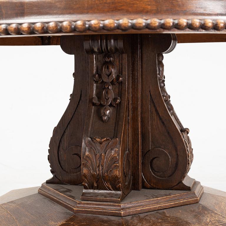 A oak and stone coffee table, first half of the 20th century.