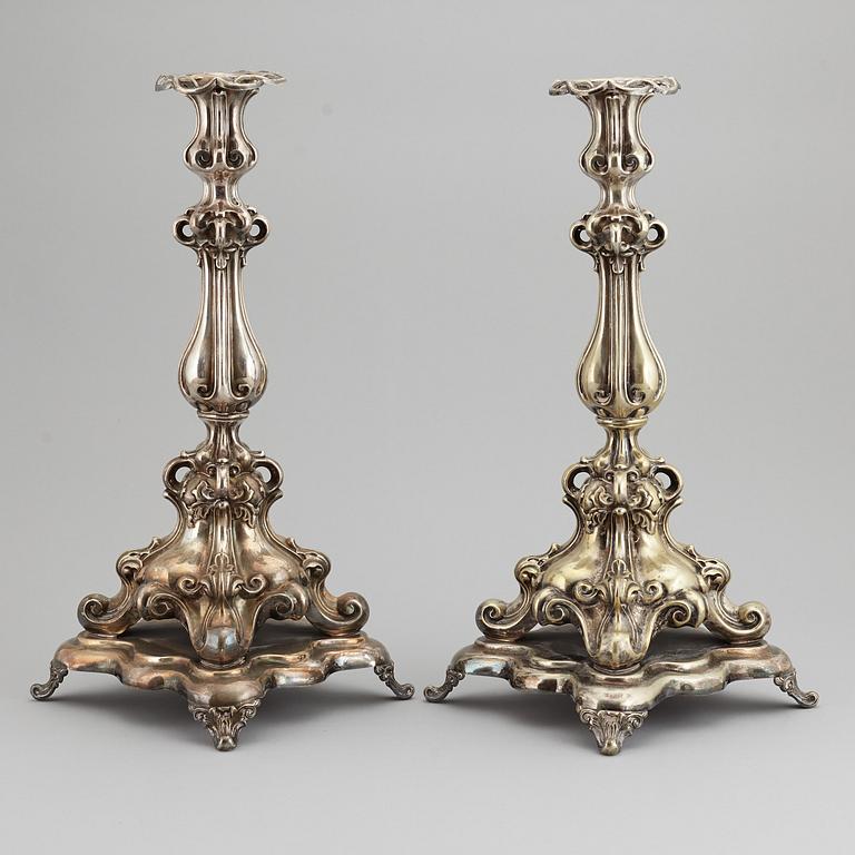 A pair of barocque style nine lights candelabra, silver plate, 20th Century.