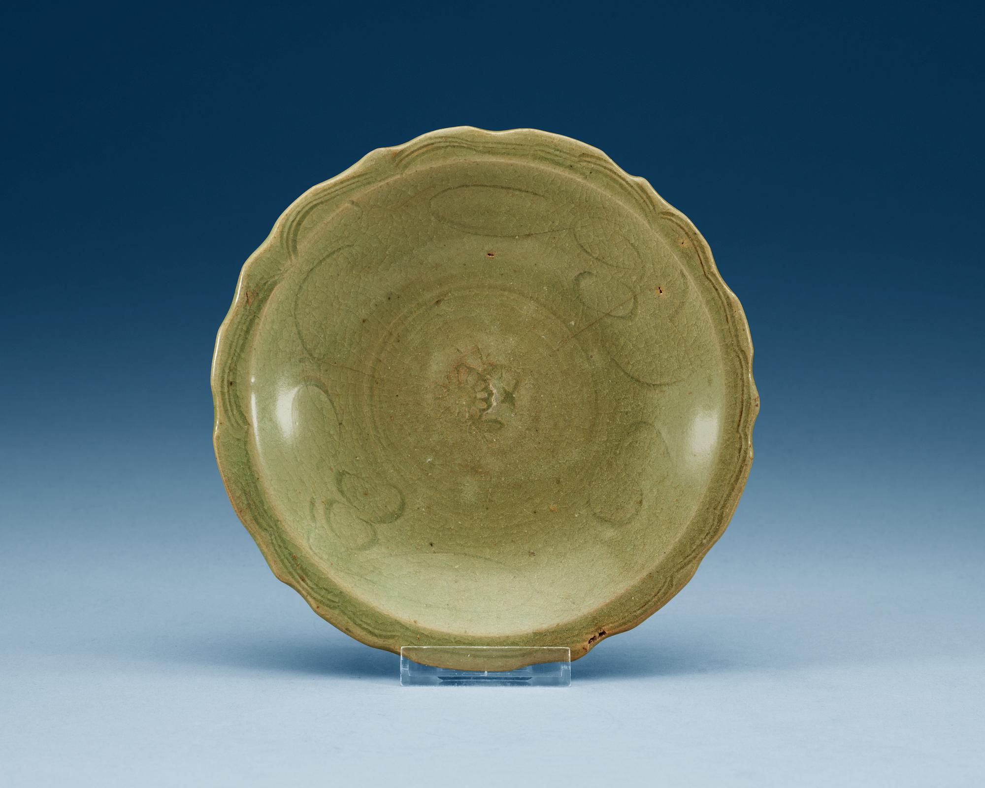 A celadon glazed dish, Yuan dynasty (1271-1368).