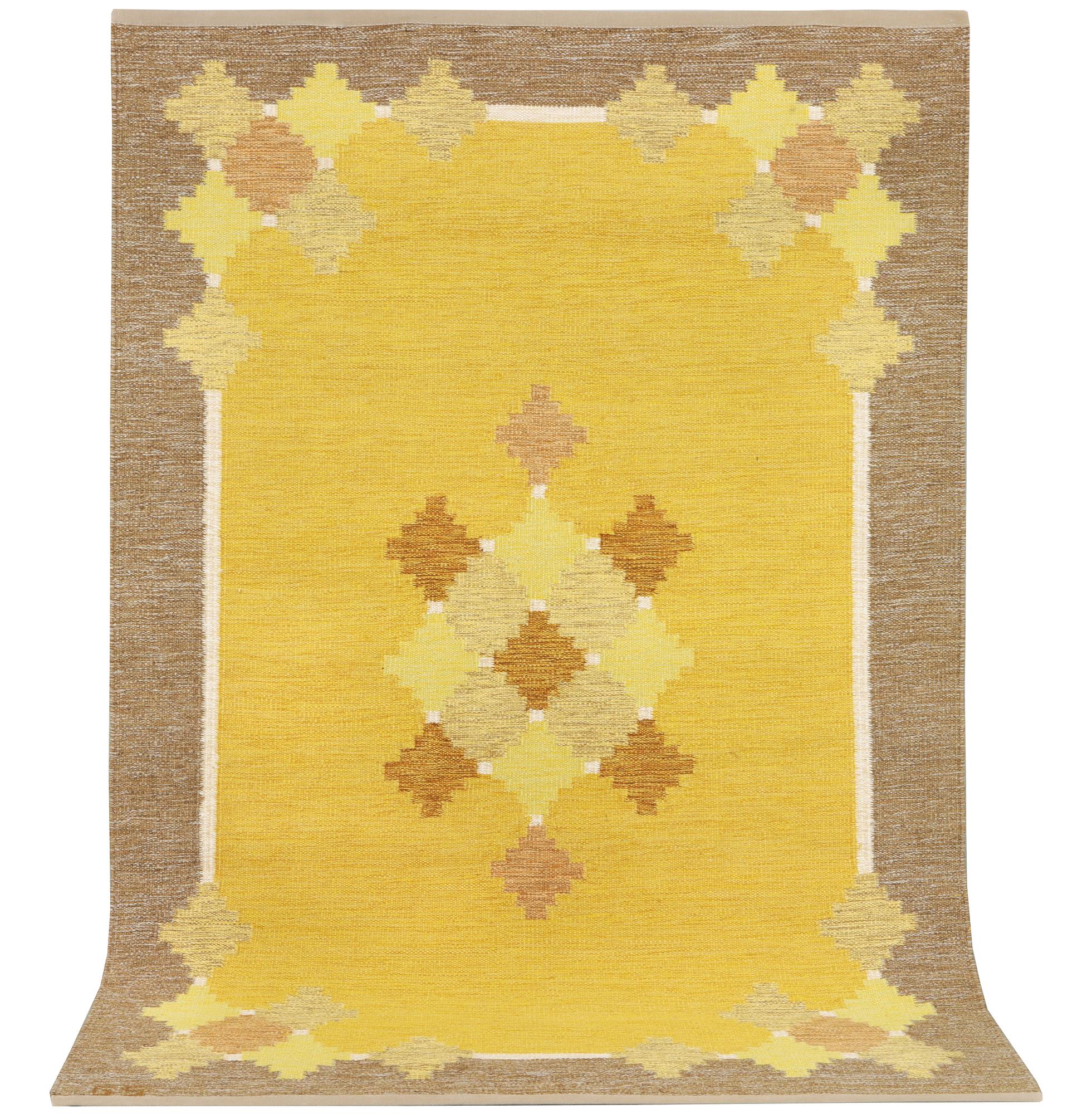 A flat weave carpet, signed GS, c. 205 x 139 cm.