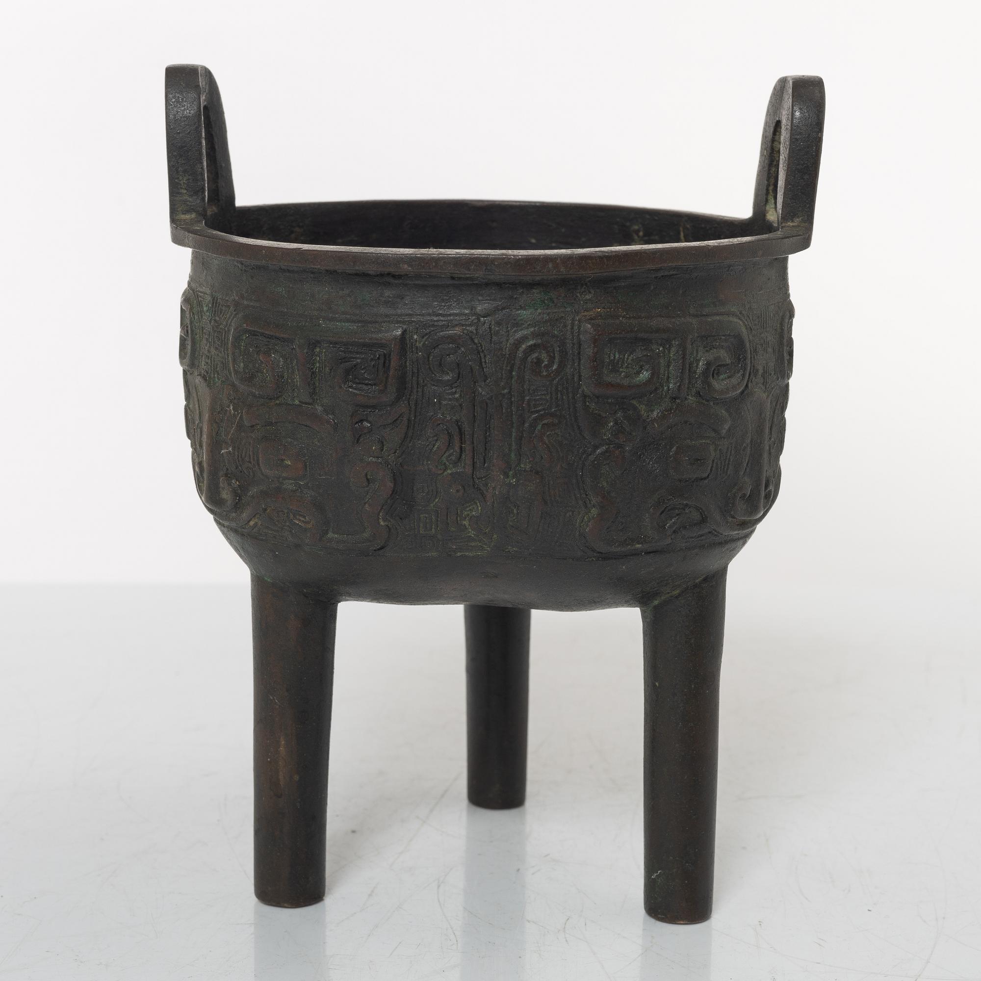 A Chinese tripod bronze censer, Ming style, Qing dynasty (1644-1912).