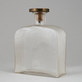 FIRMA SVENSKT TENN, a blasted glass bottle with a Björn Trägårdh pewter and brass stopper, Stockholm 1930's.