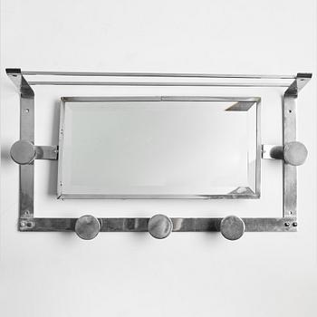 A mid 20th century shelf with mirror.