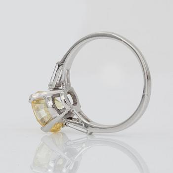 A fancy intense yellow diamond, 2.45 cts, solitaire ring.