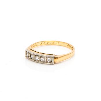 An 18K gold ring with diamonds ca. 0.22 ct in total. Päiviö Veikko, Turku 1955.
