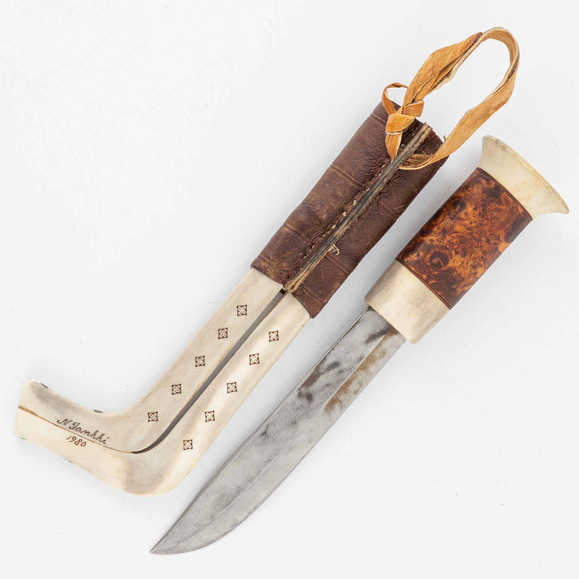 Nikolaus Fankki, A reindeer horn knife, signed and dated 1980.