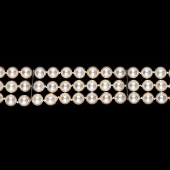 910. BRACELET, three strand cultured pearls, 7,5 mm.