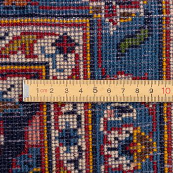 An oriental carpet, c. 340 x 240 cm.