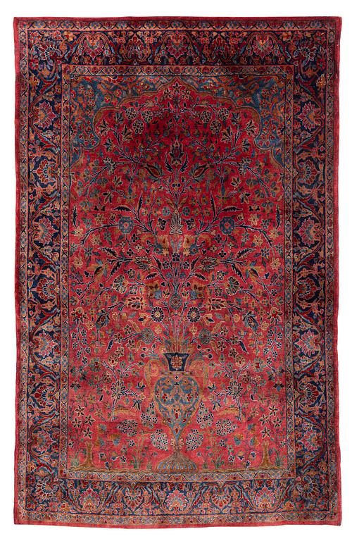An antique Manchester Kashan rug, c. 197 x 126 cm.