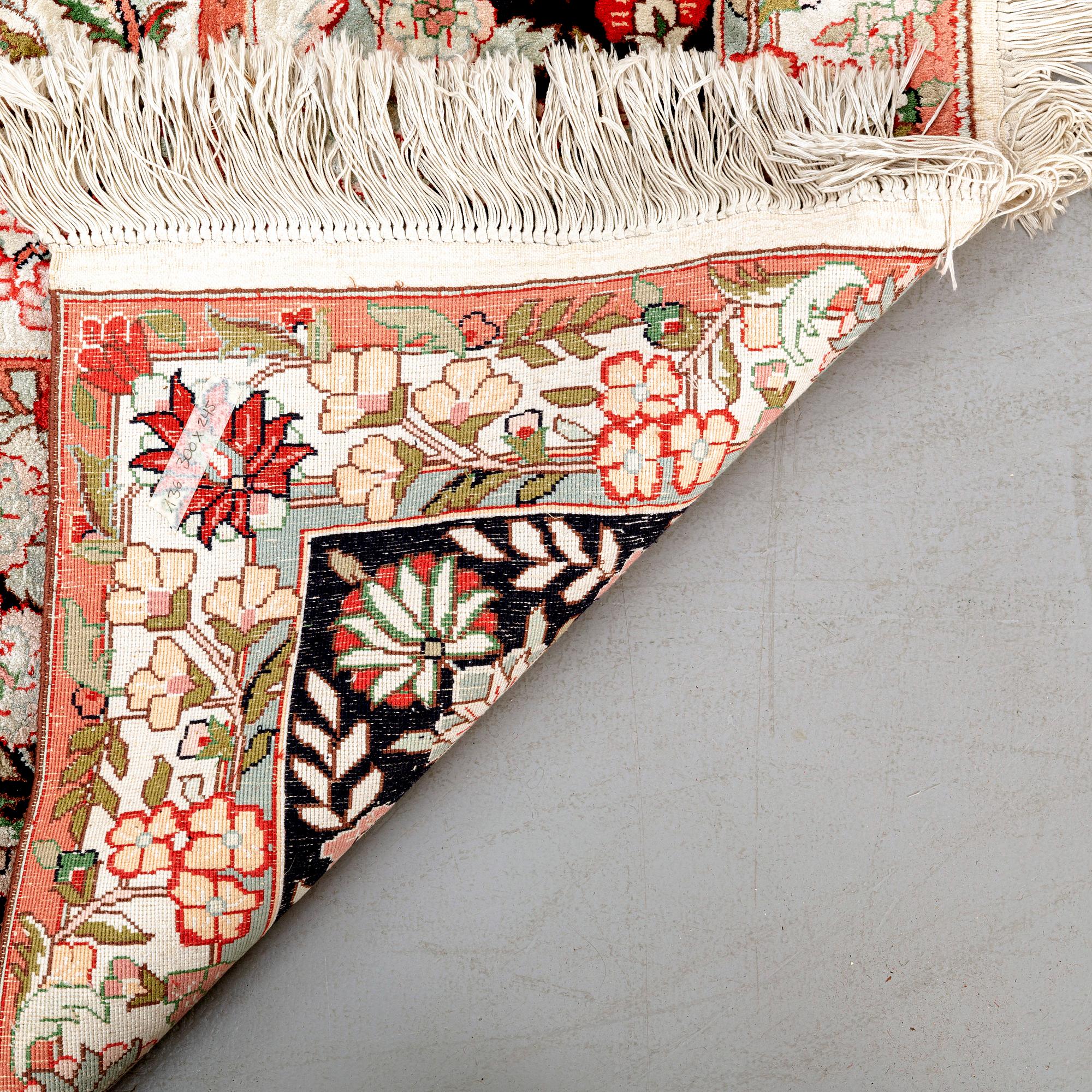 An old silk Taharan design carpet ca 296x244 cm.