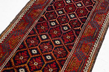 An antique Baluch rug, east Persian, ca 203 x 101 cm.