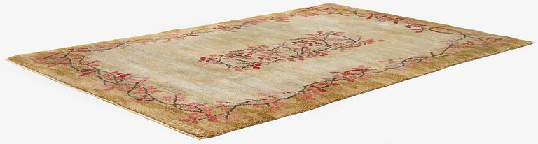 A knotted pile carpet, c. 275 x 177 cm, signed ES-FV-AJ.