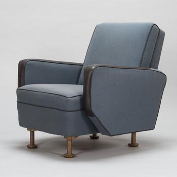Alvar Aalto, a 1962 armchair made to order by O.Y. Huonekalu- ja Rakennustyötehdas A.B. and Valaistustyö.
