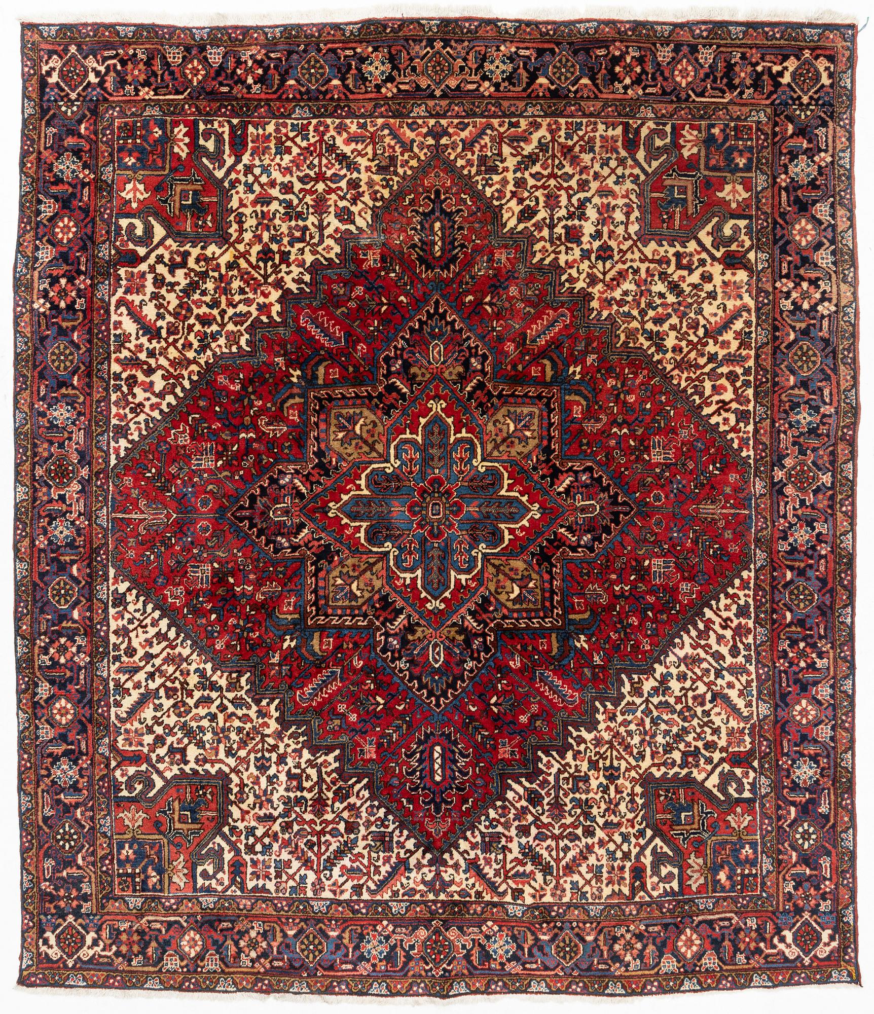 An oriental carpet, c. 330 x 285 cm.