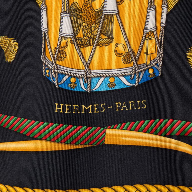 A silk scarf by Hermès "Les Tambours".