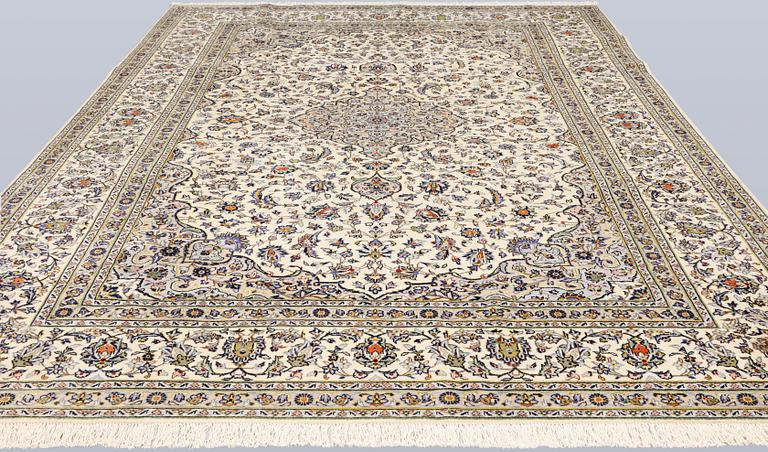 A Keshan carpet, 355 x 260 cm.