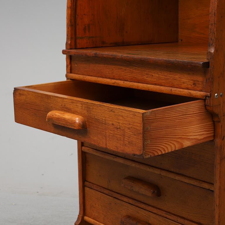 A cabinet from the forst half of the 20th century.