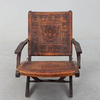 A leather folding chair, second half of the 20th century.