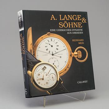 A set of 6 watch books.