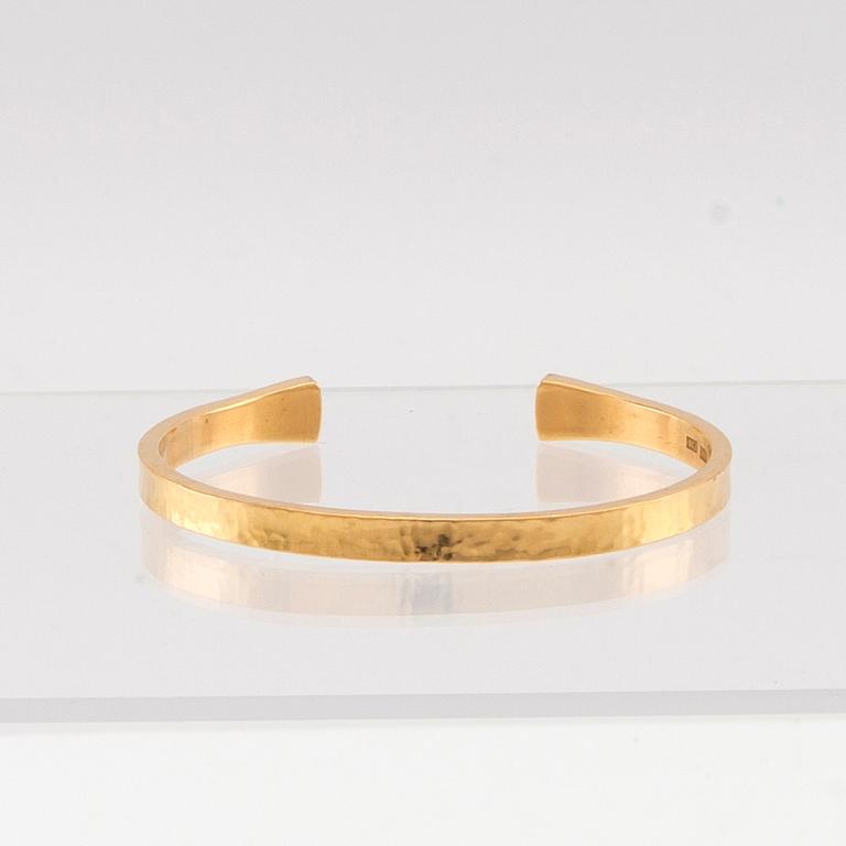 Stelt armband 18K guld 1979.