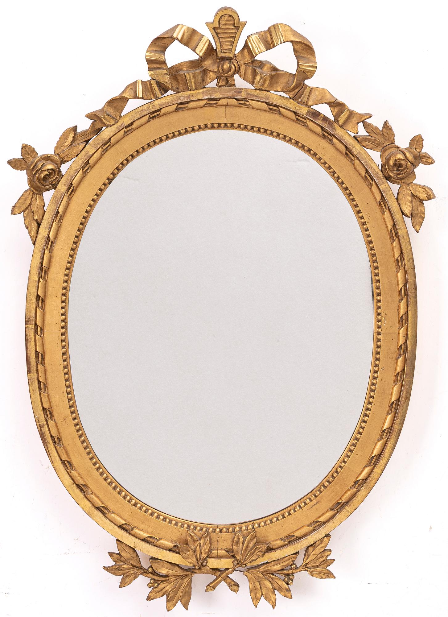 A Gustavian style mirror, early 20th century.