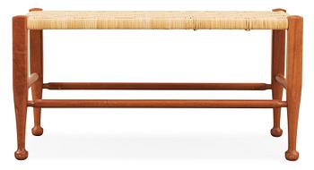 371. A Josef Frank mahogany and rattan bench, Svenskt Tenn, model 2009.
