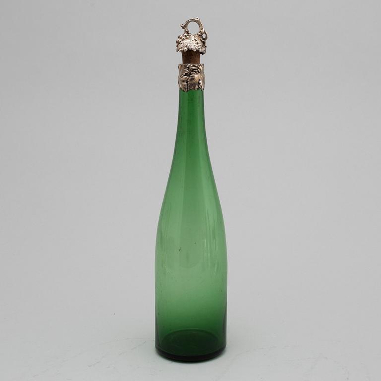 A silver mounted winebottle, Birmingham 1839.