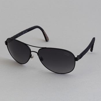 Chanel black pilot summer glasses.