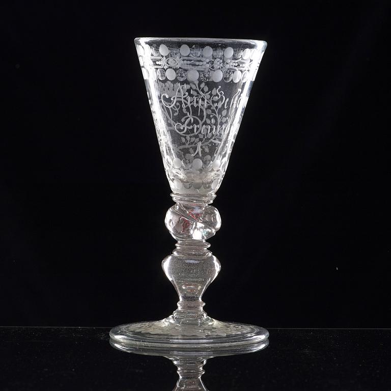 A German cut and engraved glass goblet, 18th Century.