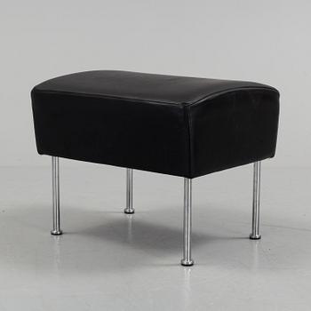 A "Cinema" footstool by Gunilla Allard.