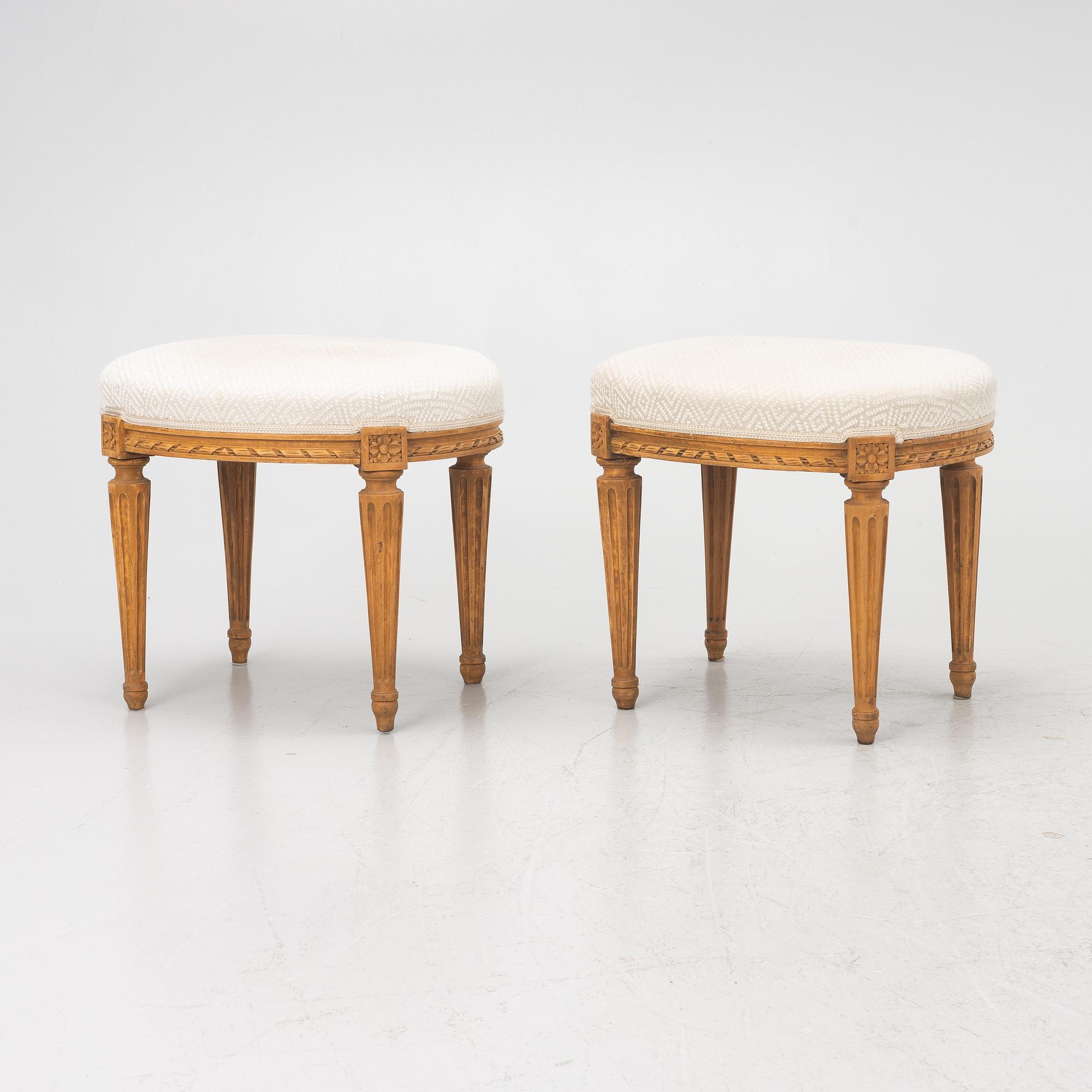 A pair of Louis XVI-style stools, late 19th century.