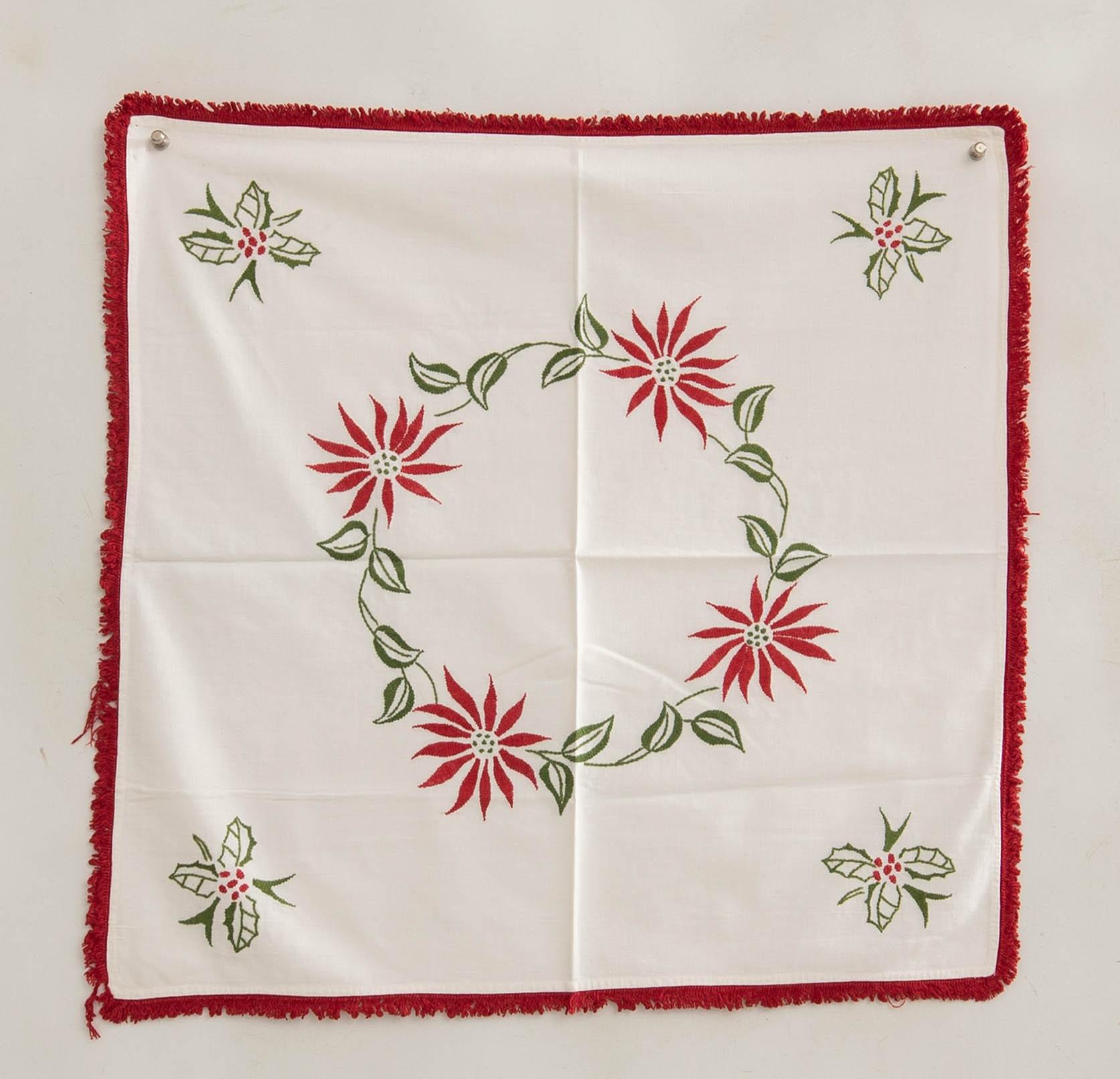 A collection of Christmas tablecloths 12 pcs first half/mid 20th century.