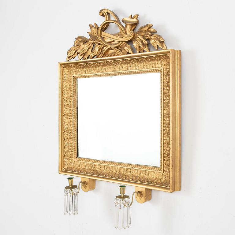 A mirrior wall sconce, 19th century.