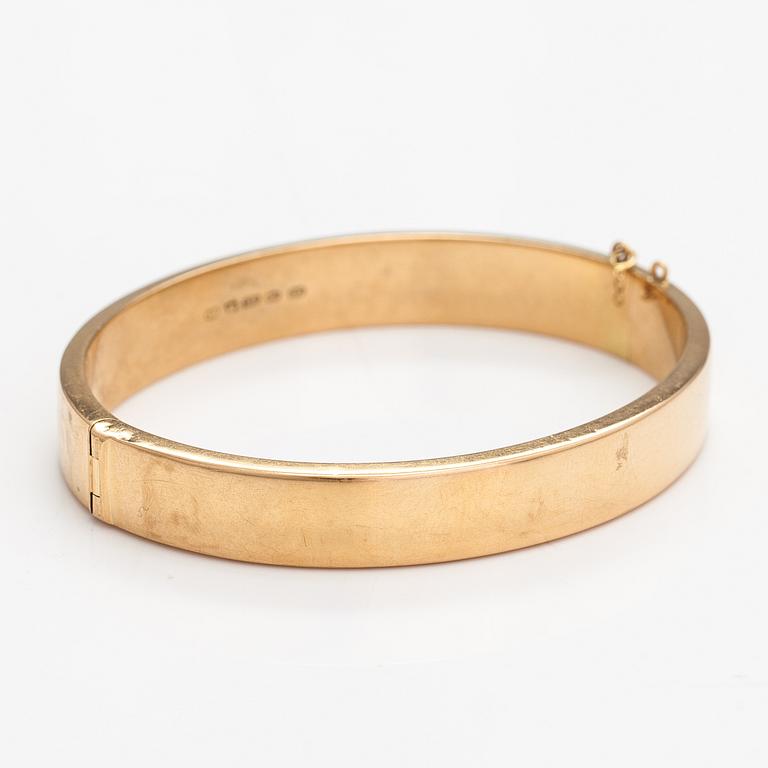 Armband, 14K guld. Kultateollisuus, Åbo 1956.