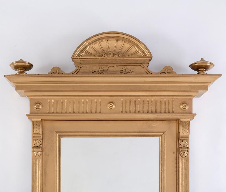 An end of the 19th Century rennaisance style bronzed mirror-.