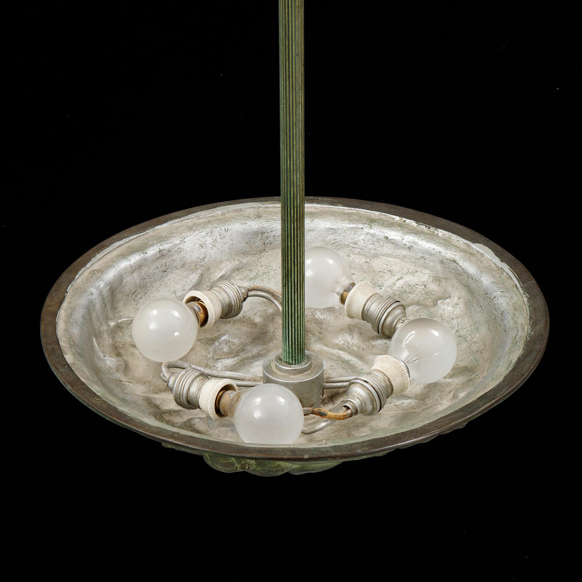 A bronze art déco ceiling light, Bracia Łopieńscy, Warszaw, 1920's/30's.