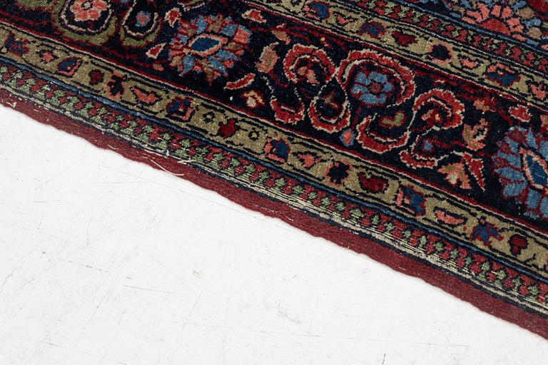 A Kashan rug, c. 208 x 138 cm.