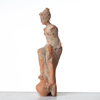 A Greek Attic figure of a Muse, probably 500-200 B.C.