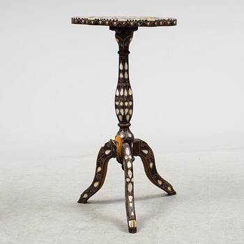 An oriental 20th century mother-of-pearl lamp table.