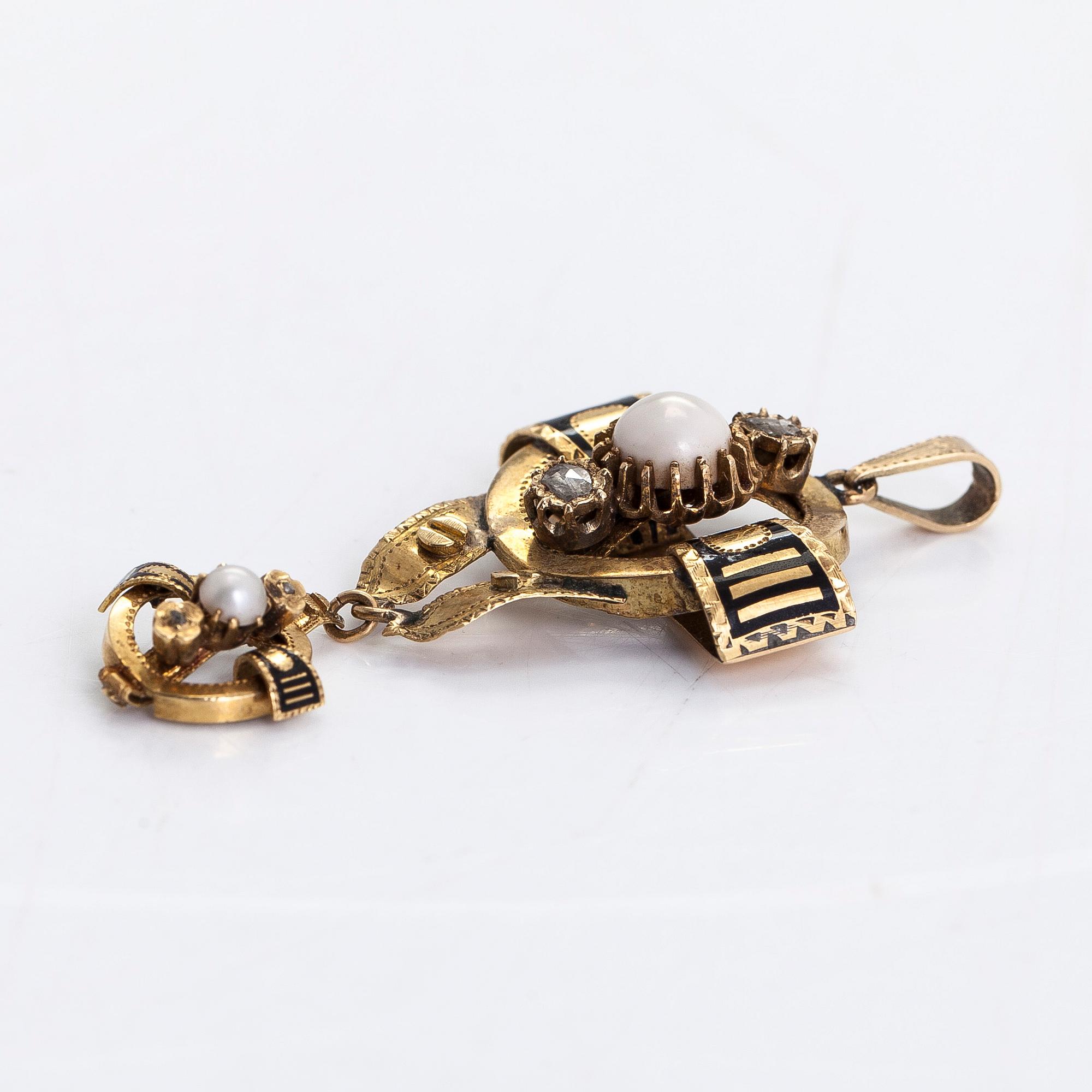 A 14K gold pendant, cultured pearls, enamel, and rose-cut diamonds.