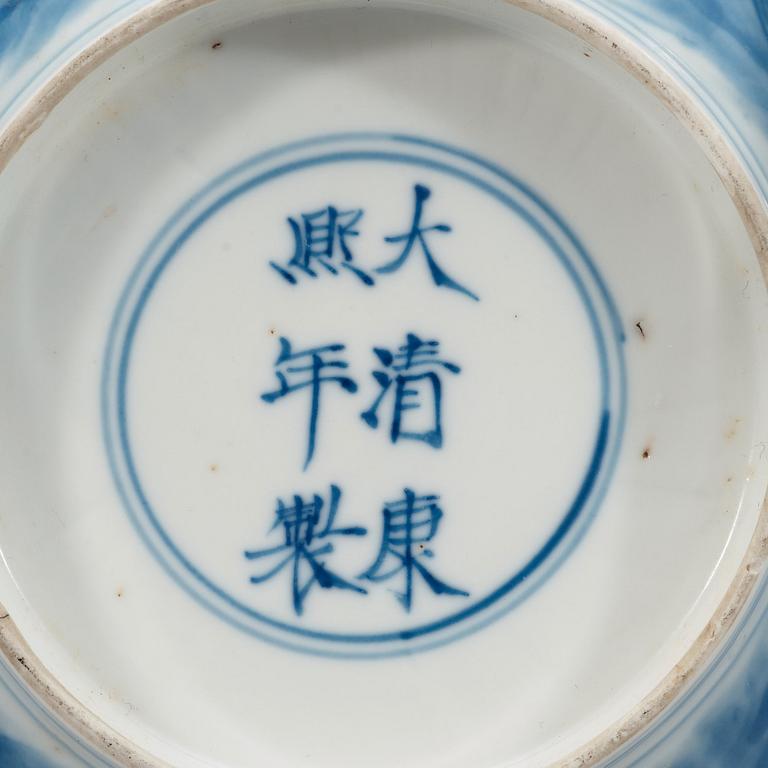 A blue and white bowl, Qing dynasty, with Kangxis six character mark and period (1662-1722).