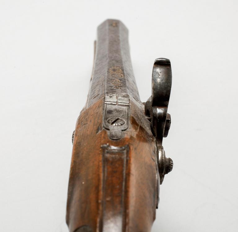 A pair of percussion guns, around the mid 19th century.