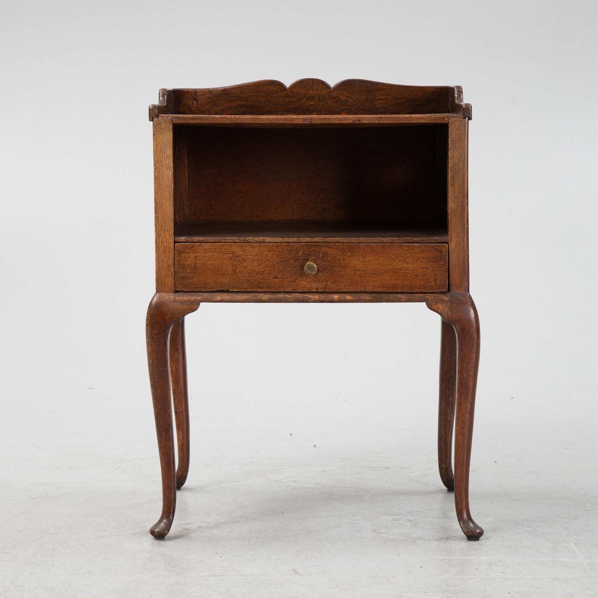 A rococo style bedside table, early 20th Century.