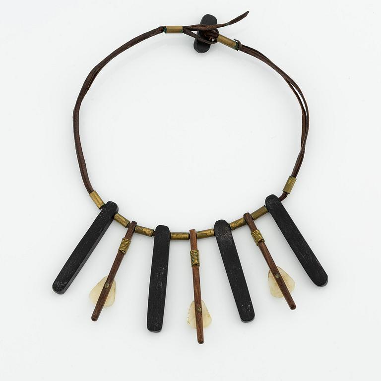 Vivianna Torun Bülow-Hübe, a necklace, wood, leather, mother-of-pearl and brass, most likely 1950's.