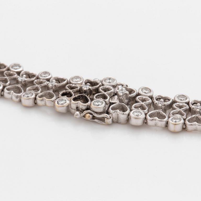 A brilliant cut diamond necklace. Total carat weight of diamonds circa 6.00 cts.