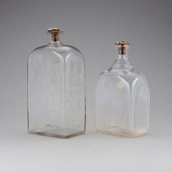 BRÄNNVINSFLASKOR, glas. 1800-/1900-tal.