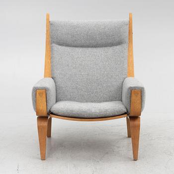 Hans J. Wegner, a model "GE 501-A" armchair, Getama, Denmark, 21st century.