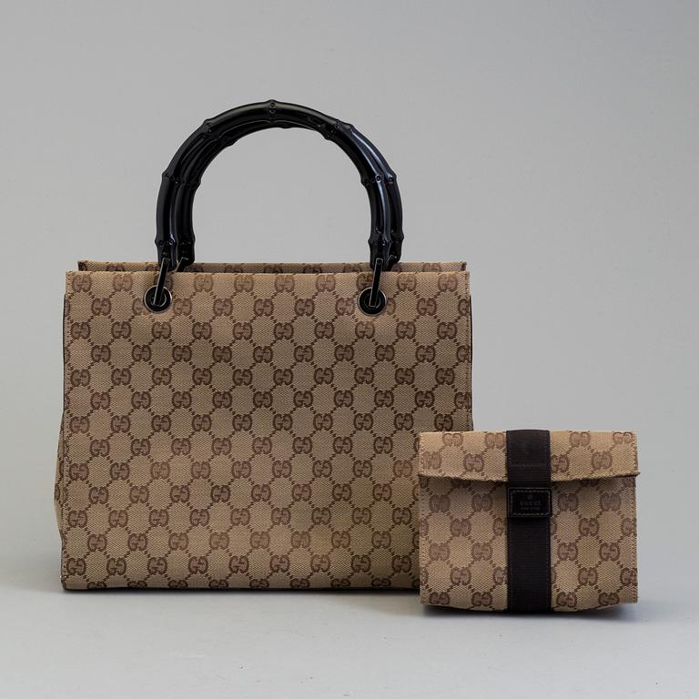 GUCCI, a monogram fabric hand bag and beauty bag.