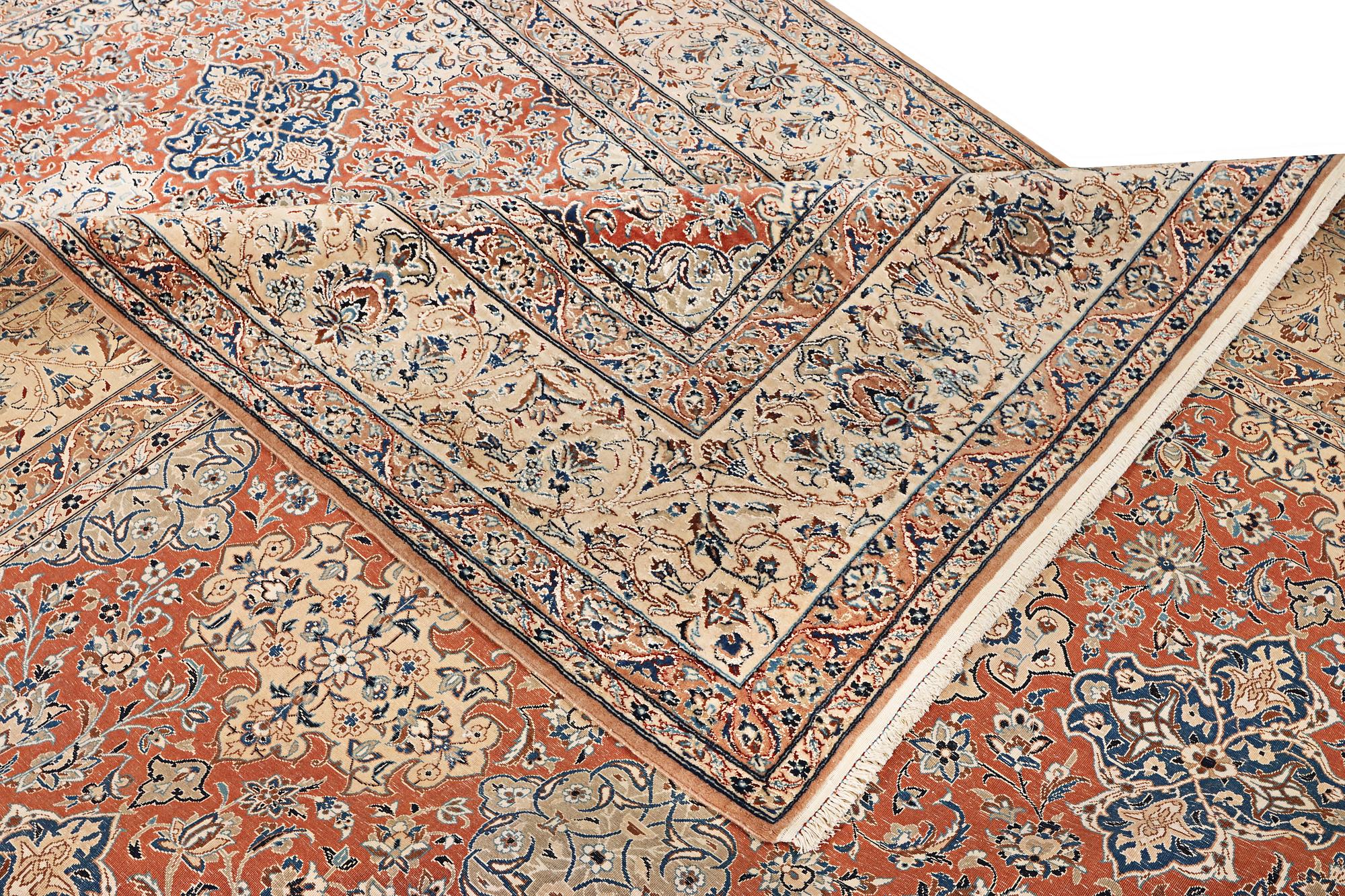 A semi-antique/old Nain carpet, part silk, c. 343 x 230 cm.